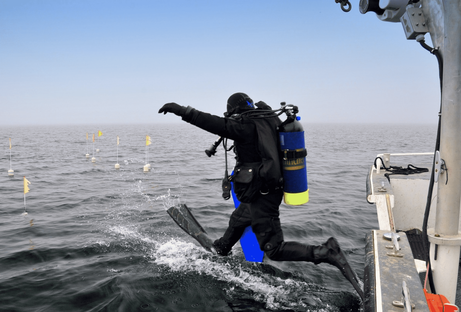 diver about to jump in the ocean
