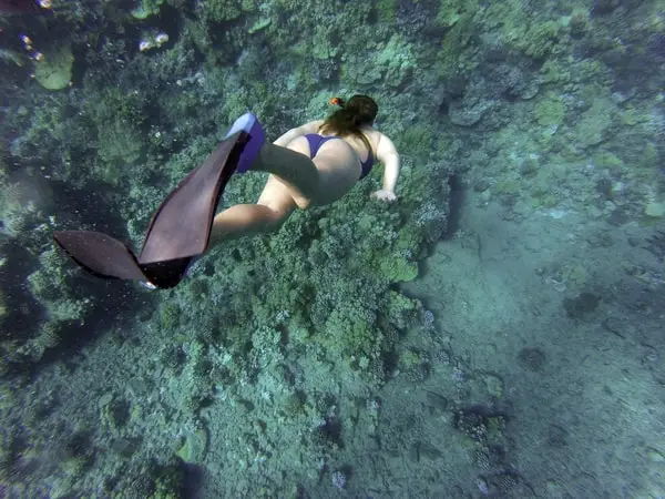 Woman doing freediving at sea 